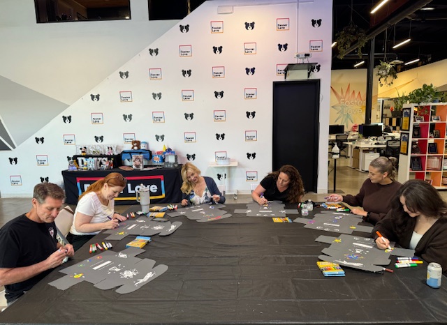 David Brandt, Brandi Pugh, Krista Murray, Cristina Hospedales, Lizzie Wilson, Duha Salamah volunteering at Foster Love. The Brea Office Team helped build Birthday Kits and STEM Kits for kids in the foster care system