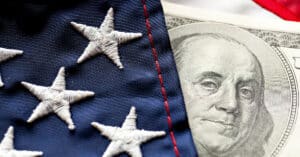 Closeup of American Flag and one hundred dollar bill | Blog - What to Expect After the Election